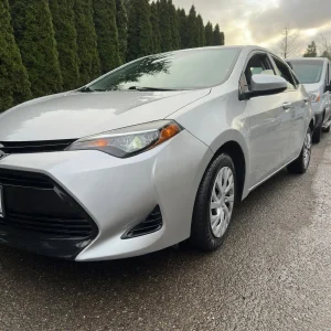 A car detail of a Carolla LE Sedan